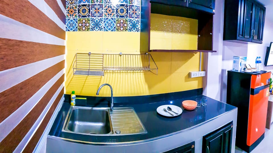 Premium Suite, 1 King Bed, Kitchenette, City View | Private kitchenette | Full-size fridge, electric kettle, cookware/dishes/utensils