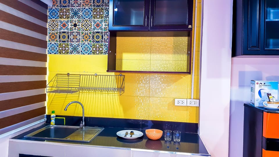 Premium Suite, 1 King Bed, Kitchenette, City View | Private kitchenette | Full-size fridge, electric kettle, cookware/dishes/utensils