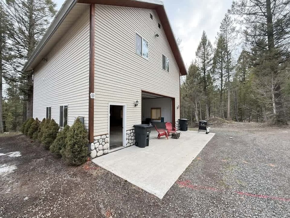 open garage with grill and firepit