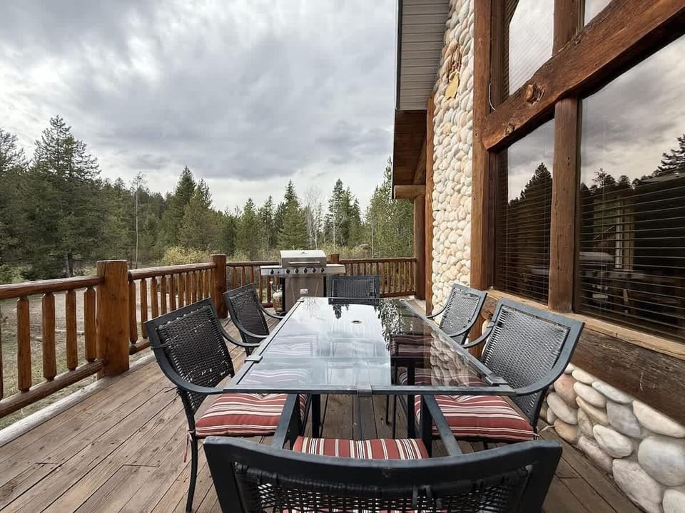 Enjoy the beautiful weather from the deck of the cabin.