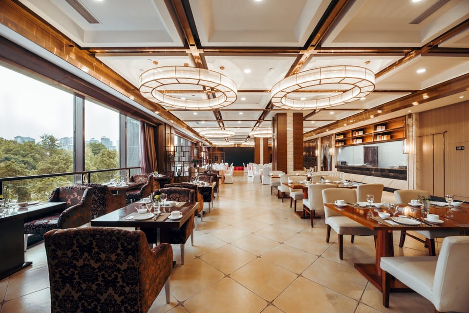 2 restaurants, breakfast, lunch, dinner served; Chinese cuisine