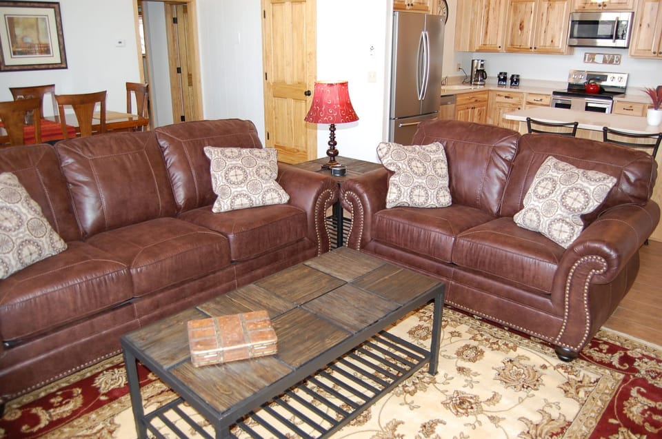 Living area with queen size pullout sofa sleeper.
