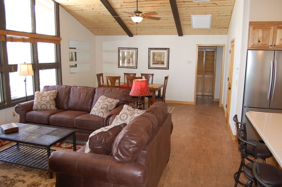 New tile and pine tongue and groove vaulted ceiling. Tall picturesque windows.