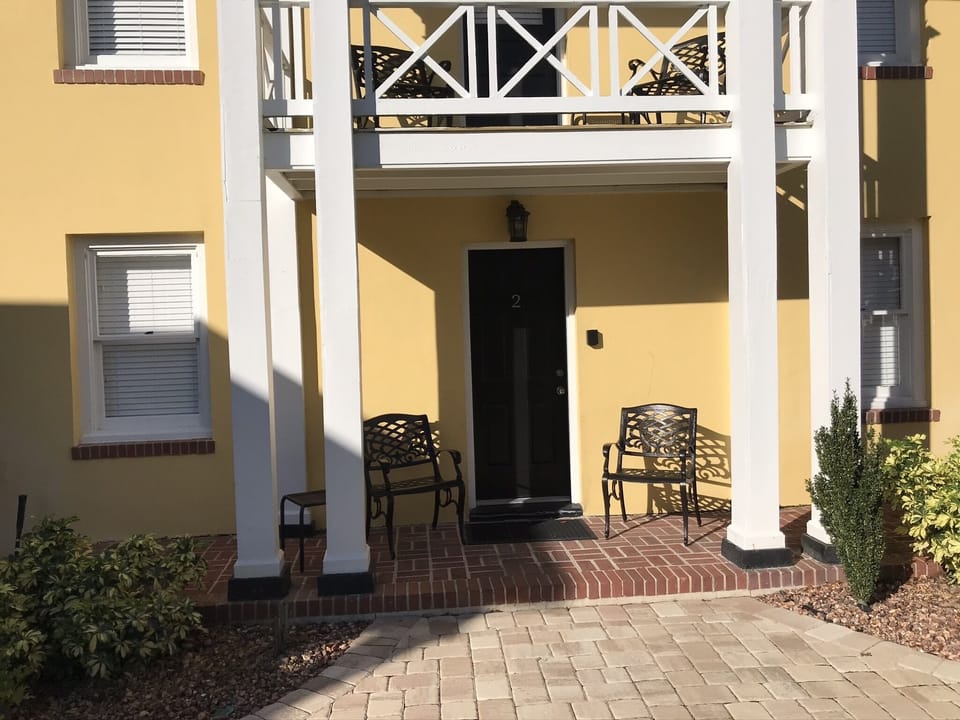 Patio with 2 chairs.