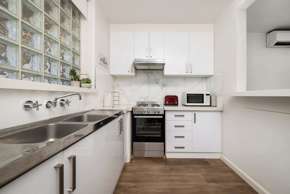 Full kitchen with gas cooktop and microwave
