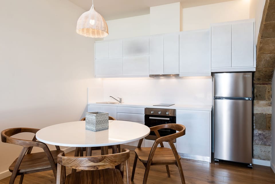 Design Apartment, 1 Bedroom (Nephalion) | Living room | 37-inch LED TV with satellite channels, TV