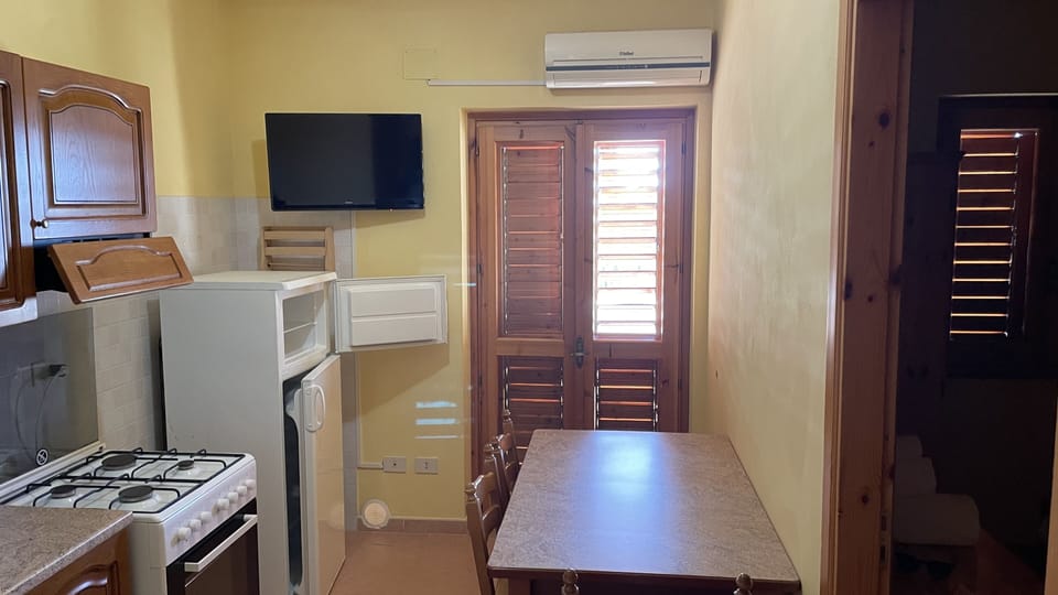 Comfort Apartment, 2 Bedrooms, Terrace (4 people) | Living area | 32-inch flat-screen TV with cable channels
