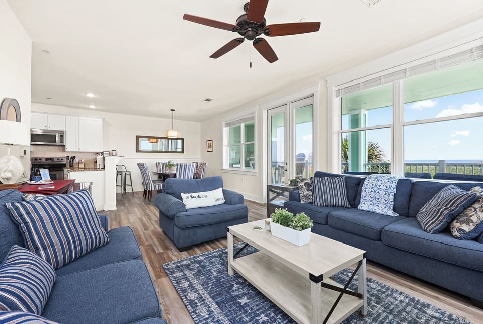 A lot of comfortable seating in living room