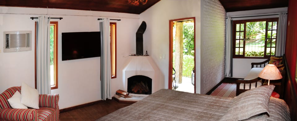 Chale Quiosque 10 | Minibar, blackout drapes, iron/ironing board, free WiFi
