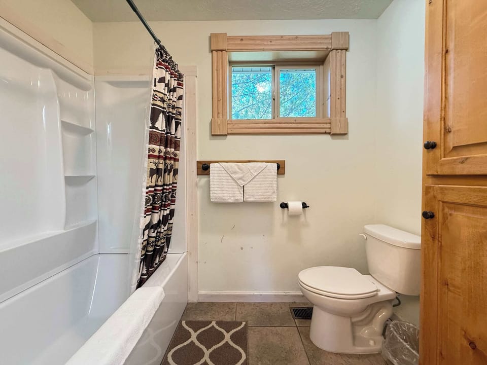 Loft bathroom with deep soaking tub.