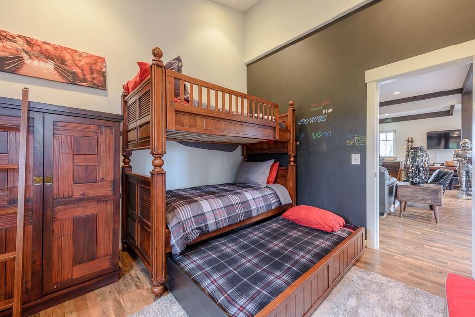 Bunk Bedroom on Main Level with Twin over Twin Bunkbed, and a Pull-out Twin Trundle Bed