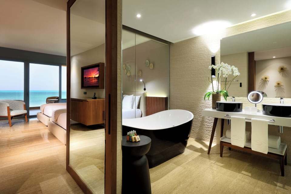 Separate tub and shower, jetted tub, designer toiletries, hair dryer