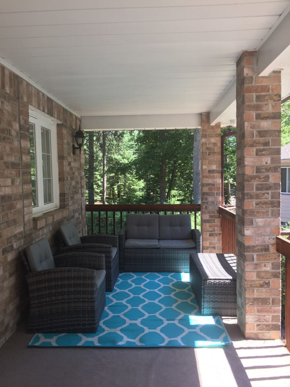 Outside seating area on the covered balcony.