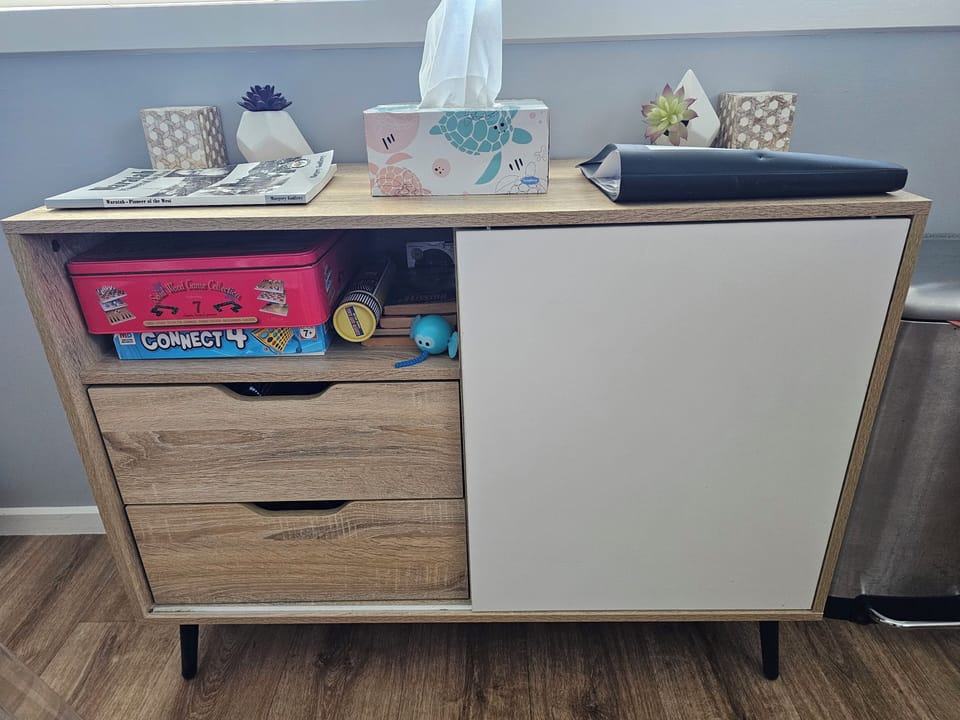Cupboard of board games and toys for the young and young at heart