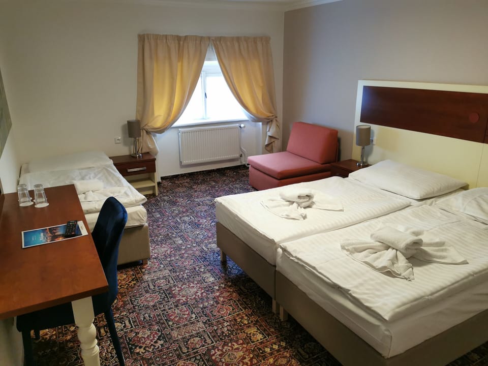 Desk, blackout drapes, iron/ironing board, free WiFi