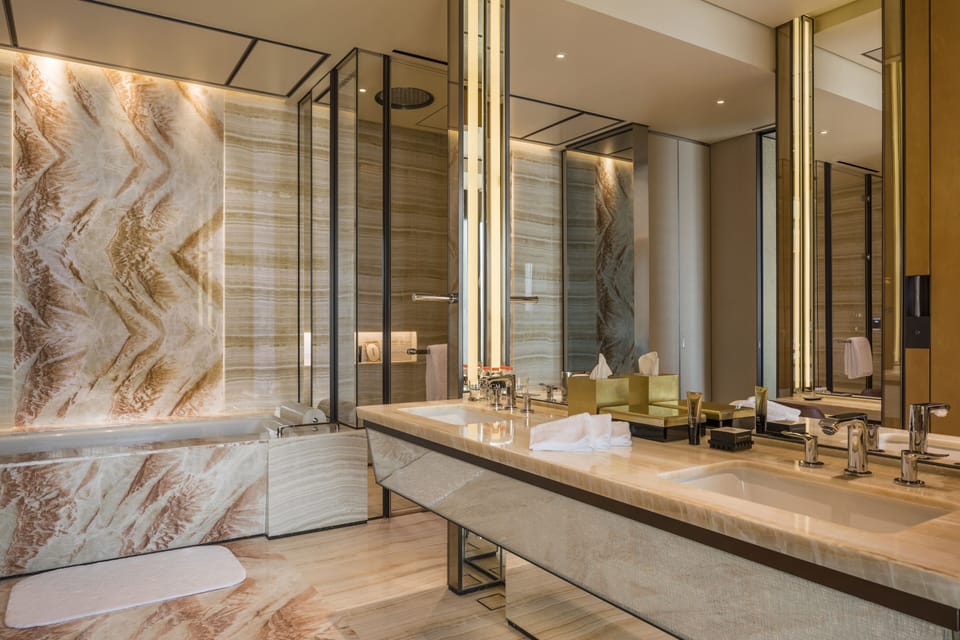 Suite | Bathroom | Separate tub and shower, rainfall showerhead, designer toiletries