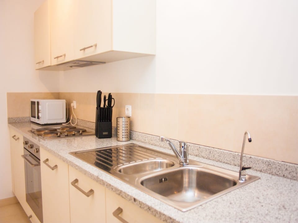 Apartment, 2 Bedrooms | Private kitchenette | Full-size fridge, microwave, oven, stovetop