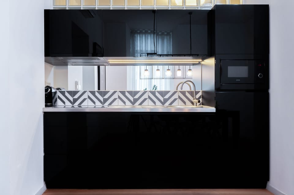 Deluxe Apartment, 1 Bedroom, River View (1st.floor) | Private kitchen | Full-size fridge, microwave, stovetop, espresso maker