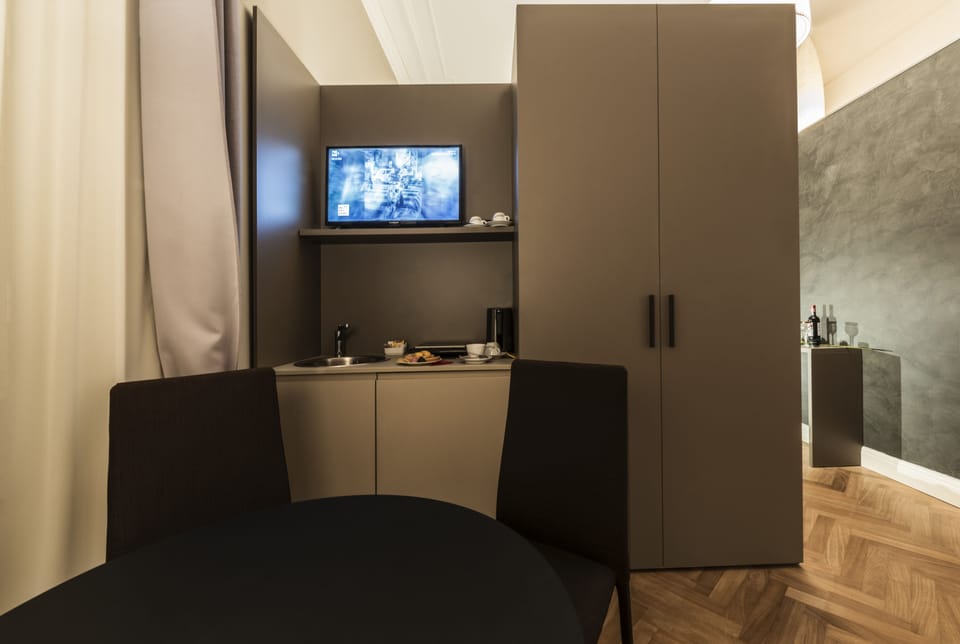 Superior Suite, 1 King Bed with Sofa bed | Living area | Flat-screen TV