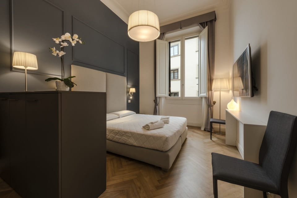 Family Suite | Down comforters, minibar, in-room safe, desk