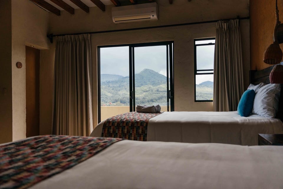 Standard Double Suite | Premium bedding, down comforters, pillowtop beds, blackout drapes