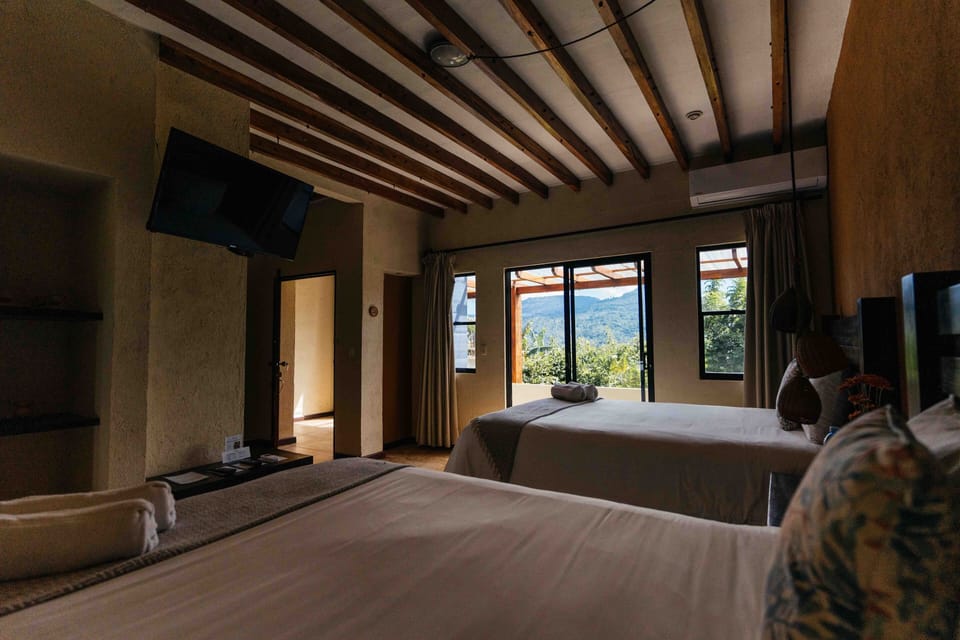 Standard Double Suite | Premium bedding, down comforters, pillowtop beds, blackout drapes