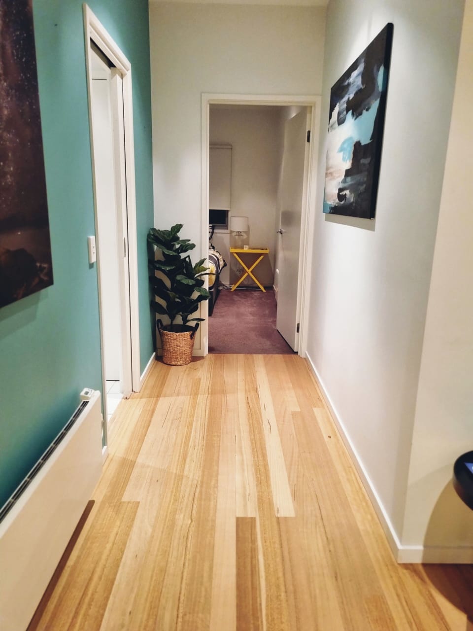 Hallway leading to Queen Bedroom & Main Bathroom & Laundry