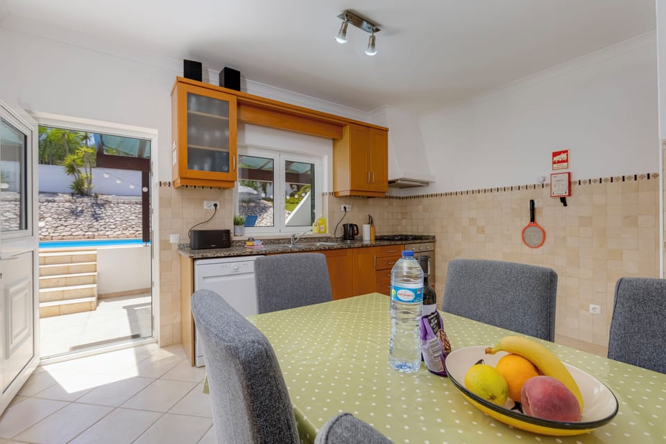 Direct access from the kitchen to pool and outside dining area