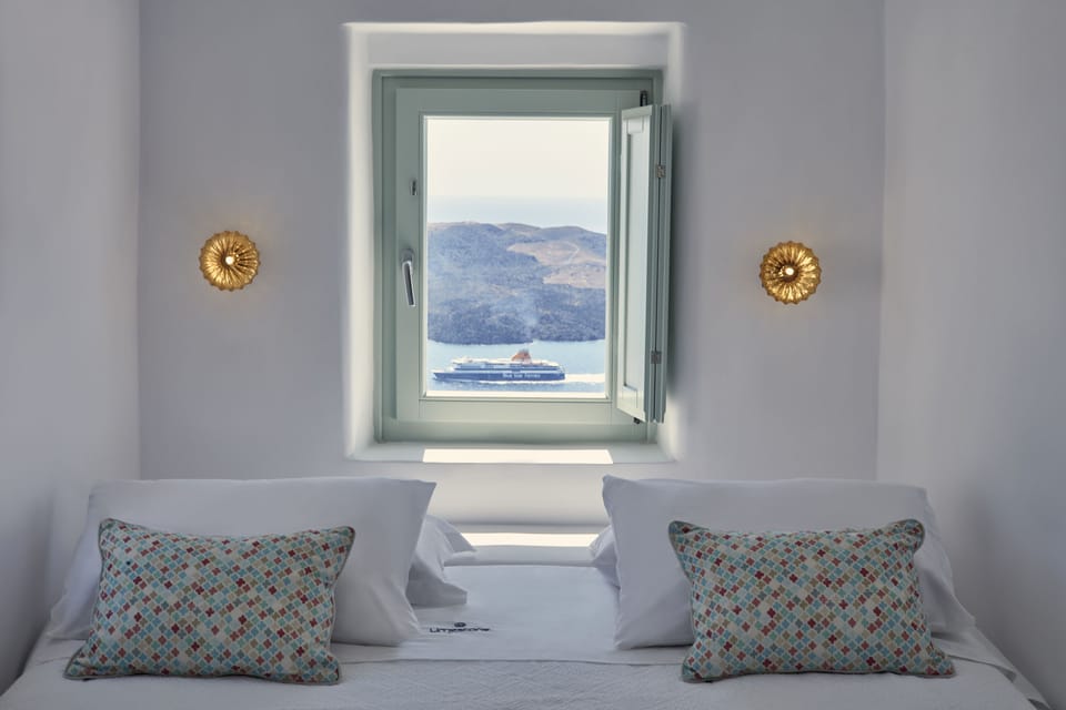 Junior Suite, Hot Tub, Sea View | Minibar, in-room safe, soundproofing, iron/ironing board