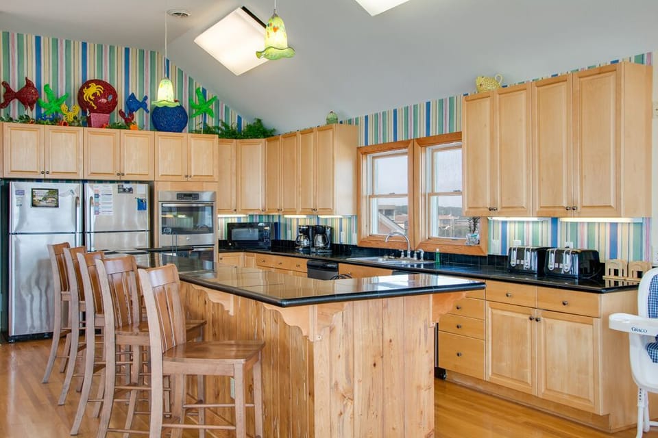 KD01: Greenwaves III | Top Level Kitchen