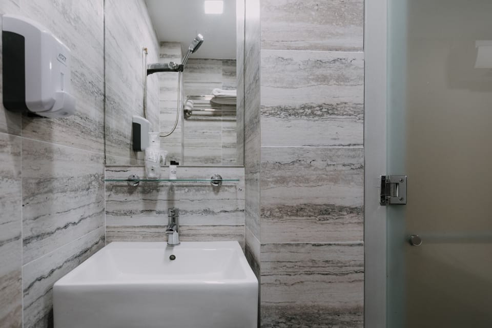 S - No Window | Bathroom | Shower, free toiletries, hair dryer, towels