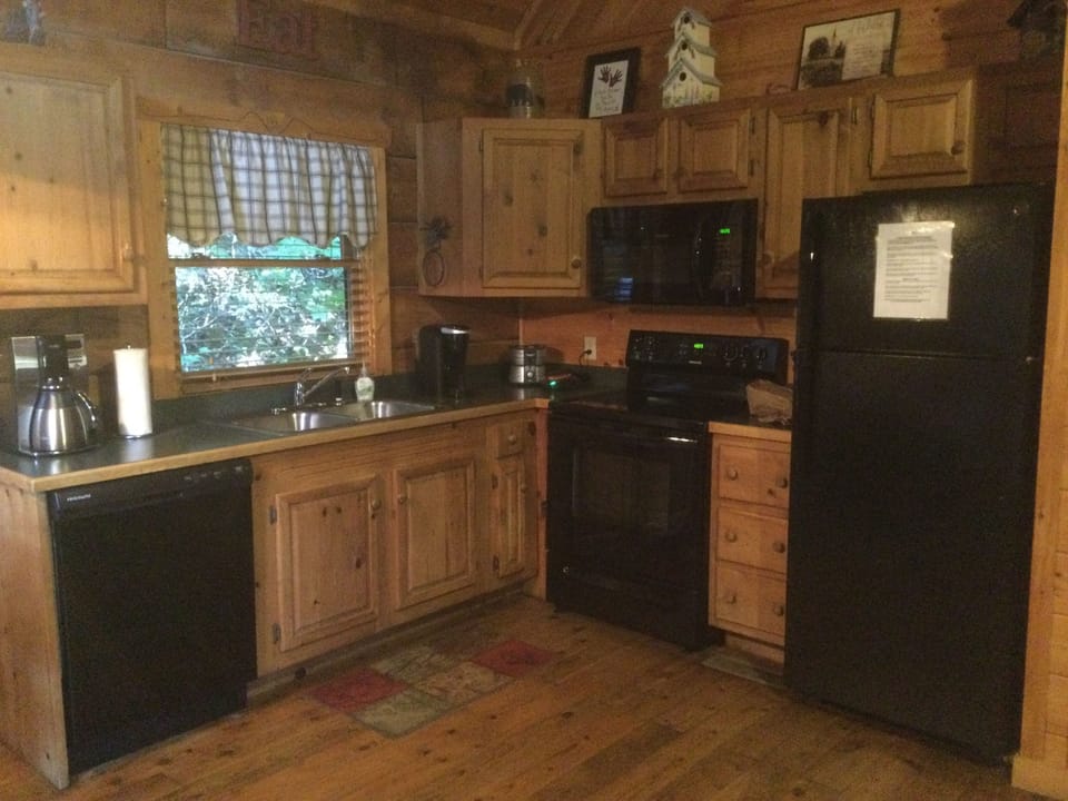 Fully stocked kitchen with new appliances.