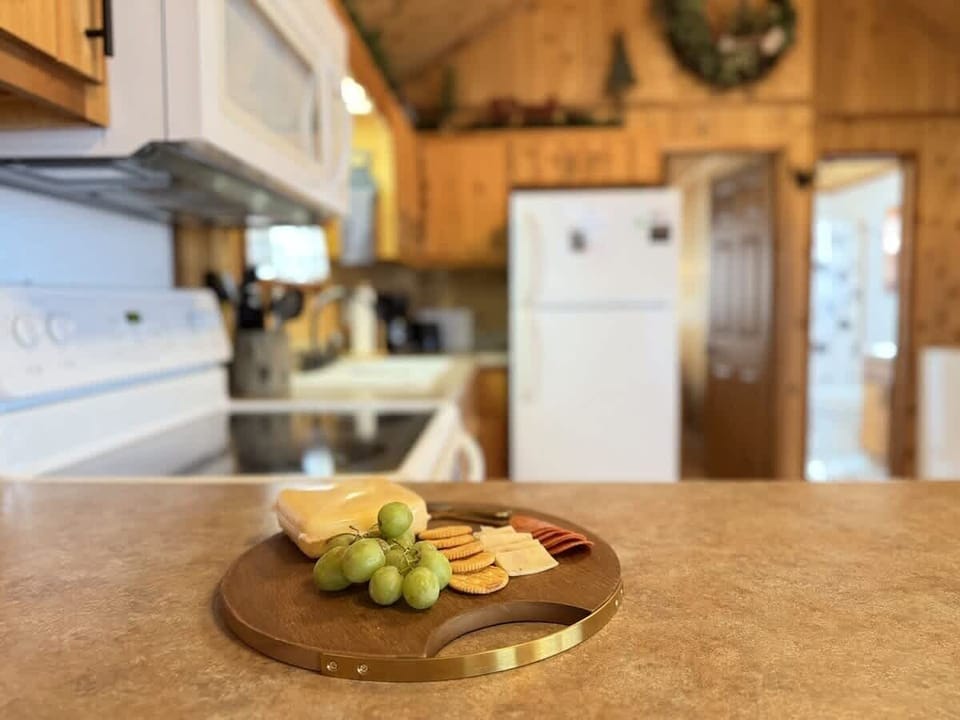 Prepare a home cooked meal in this cozy and fully equipped kitchen.