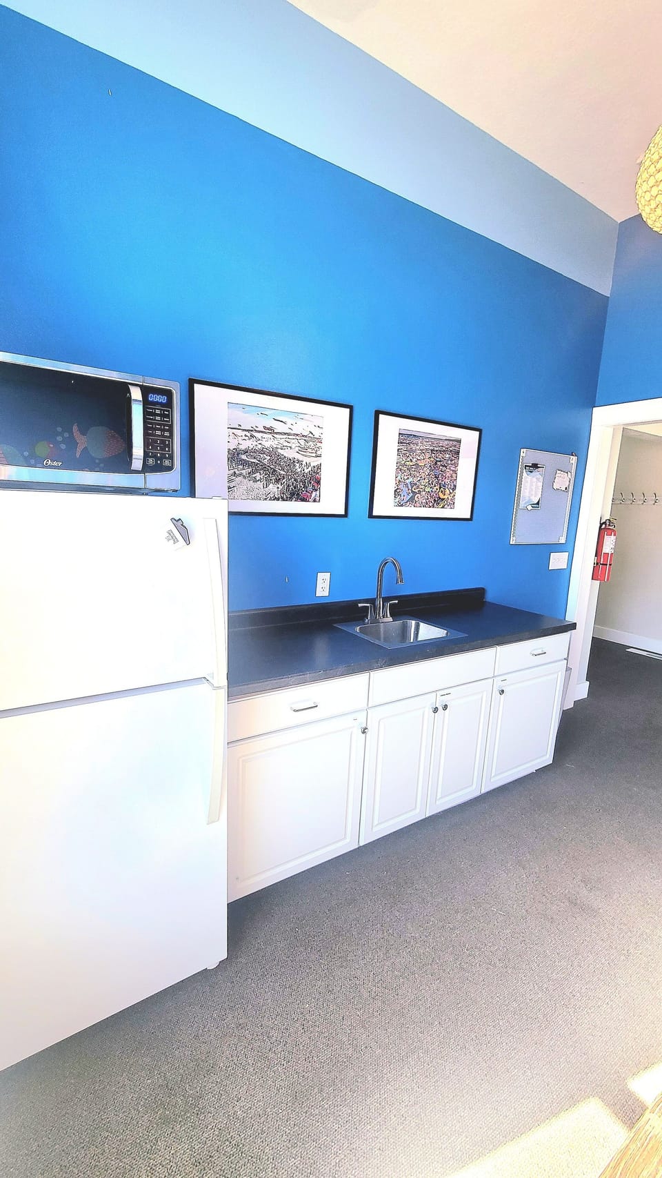 Upstairs is our media area, each week we update with the latest news for the area. There is a refrigerator and microwave here.