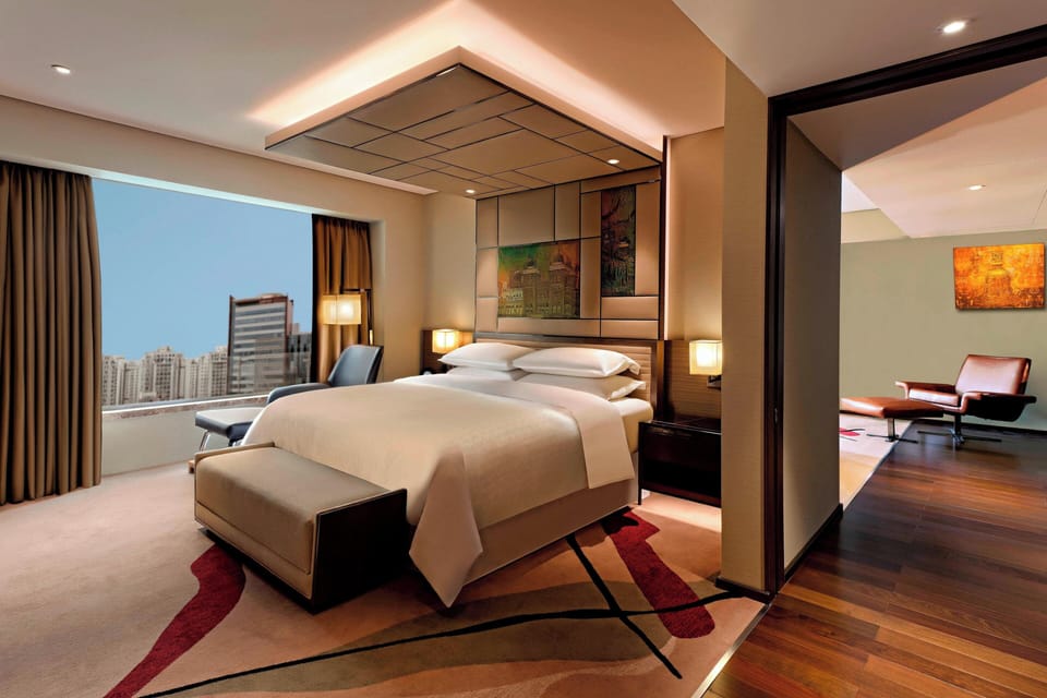 Hypo-allergenic bedding, down comforters, minibar, in-room safe