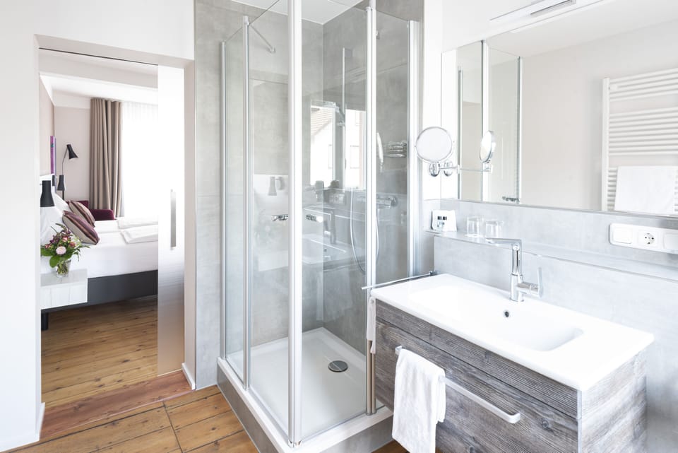 Shower, free toiletries, hair dryer, bathrobes