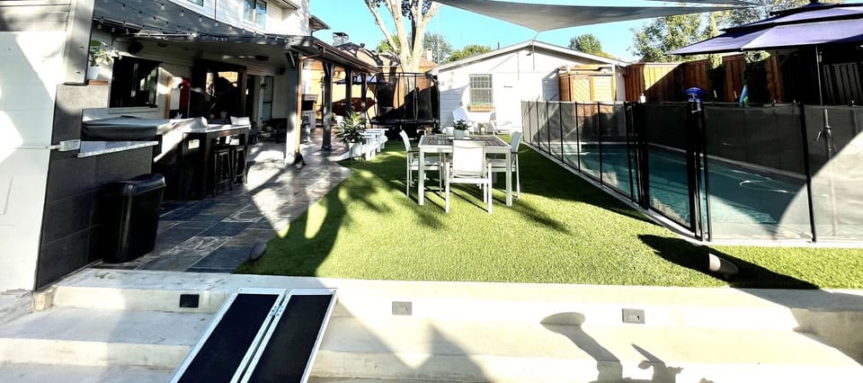 Backyard view of the main house(left, where we live) & the guest house(right). 