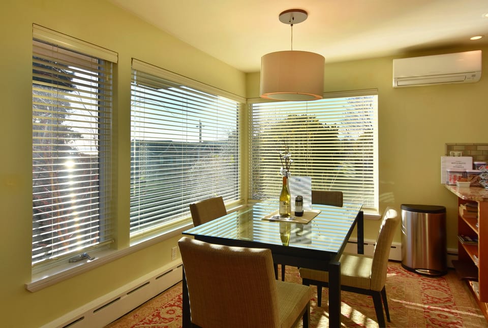 Open concept dining area. Ductless A/C for cooling and heat.