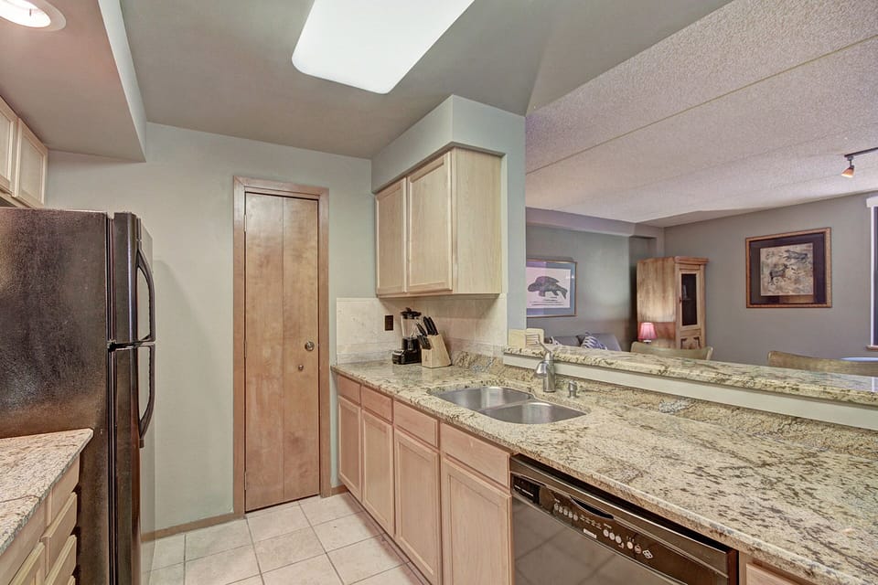 Condo, 1 Bedroom | Private kitchen | Fridge, microwave, dishwasher, coffee/tea maker