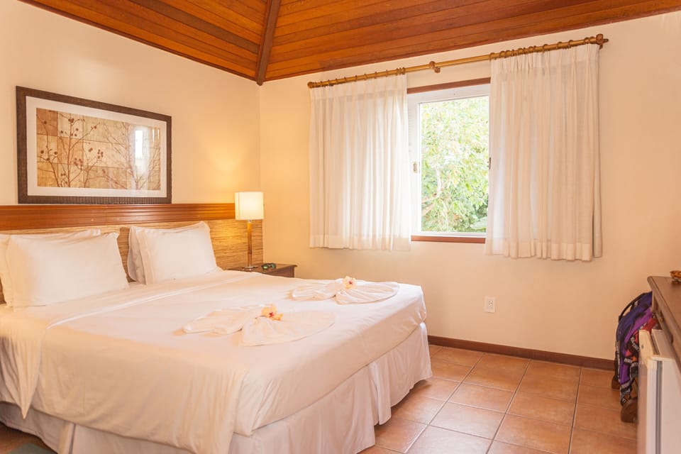 Double or Twin Room, Partial Ocean View | Minibar, in-room safe, free WiFi, bed sheets
