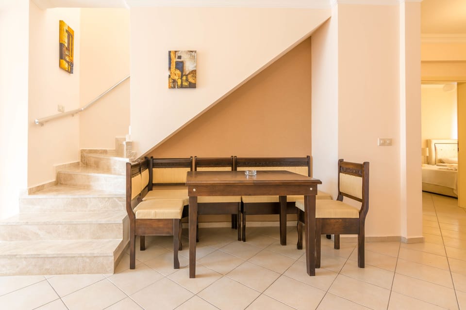 Deluxe Apartment, 3 Bedrooms | Living area | LCD TV