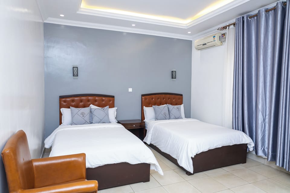 Deluxe Twin Room, Balcony | Desk, laptop workspace, iron/ironing board (on request), WiFi (free)