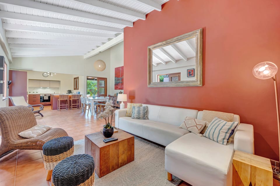 Experience comfort and relaxation in our spacious living room, where ample seating and tasteful decor create the perfect atmosphere for unwinding and entertaining.