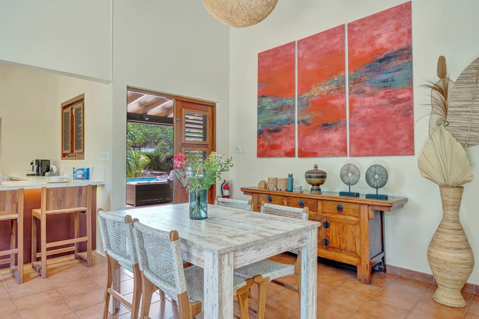 , seamlessly blending the living and dining areas for a spacious and inviting atmosphere perfect for gatherings and relaxation.