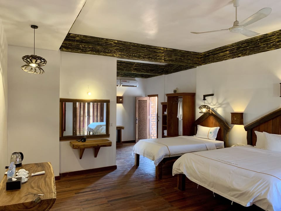 Courtyard Suite Twin Pool View Room | 1 bedroom, premium bedding, pillowtop beds, minibar
