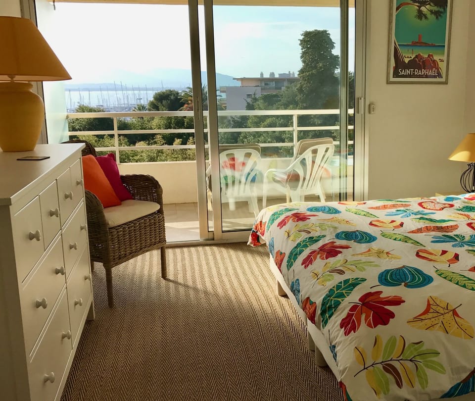 Bedroom with balcony, sea views, with super-king size bed.