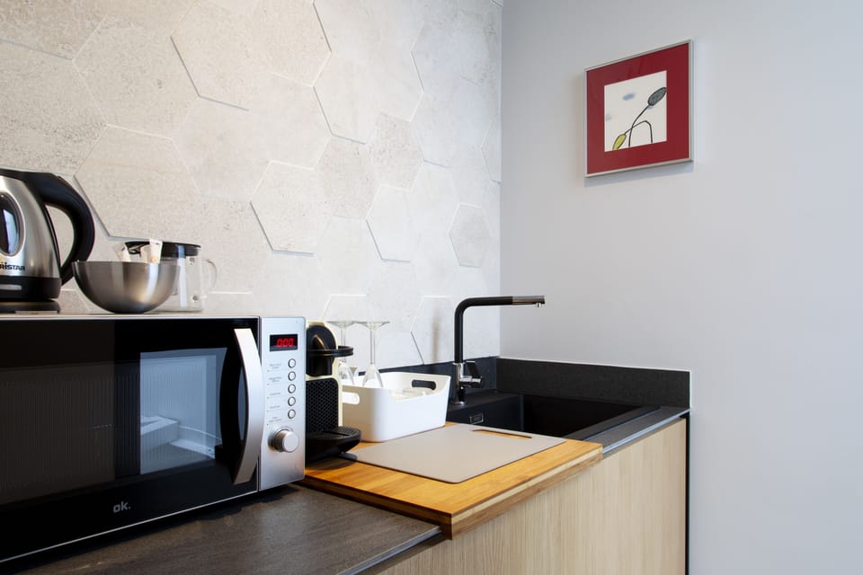 Superior Double Room, Courtyard Area | Private kitchenette | Fridge, microwave, coffee/tea maker, electric kettle