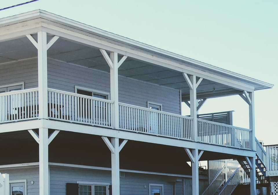 This apartment is upstairs, on 2nd floor with a realty business below.
