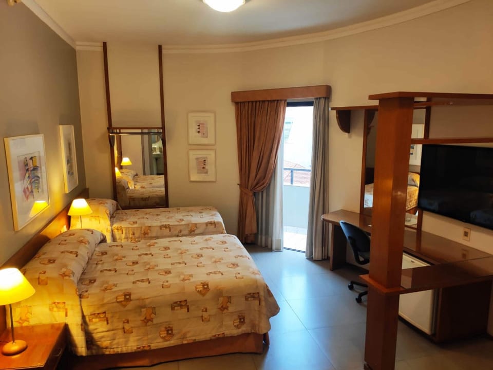 Comfort Triple Room | Minibar, desk, blackout drapes, free WiFi
