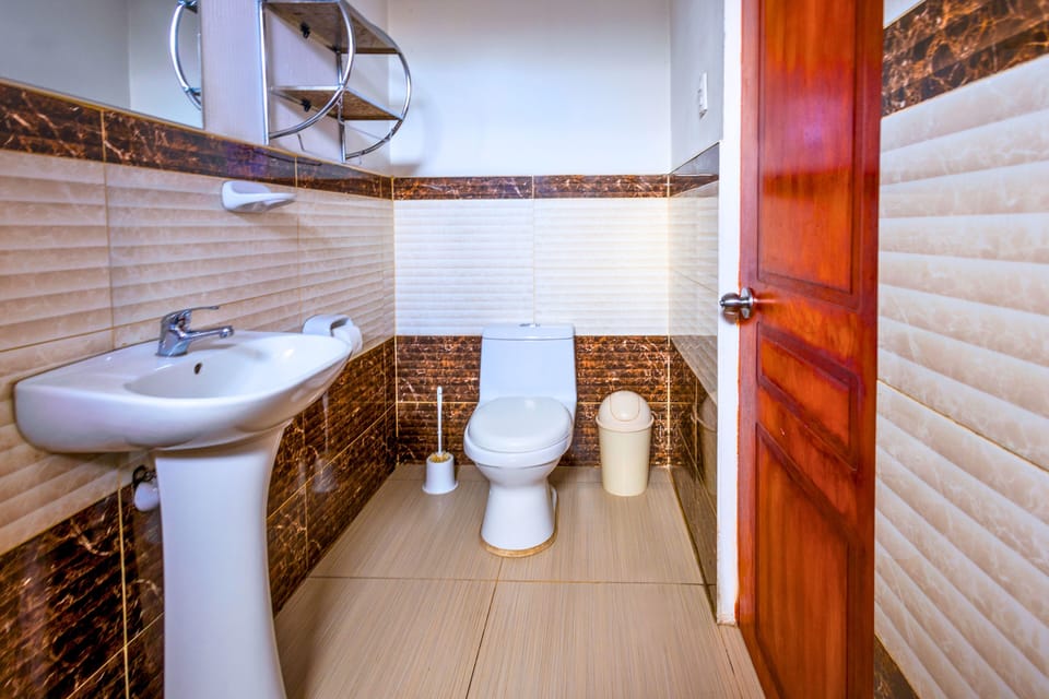 Standard Quadruple Room | Bathroom | Shower, rainfall showerhead, towels, soap
